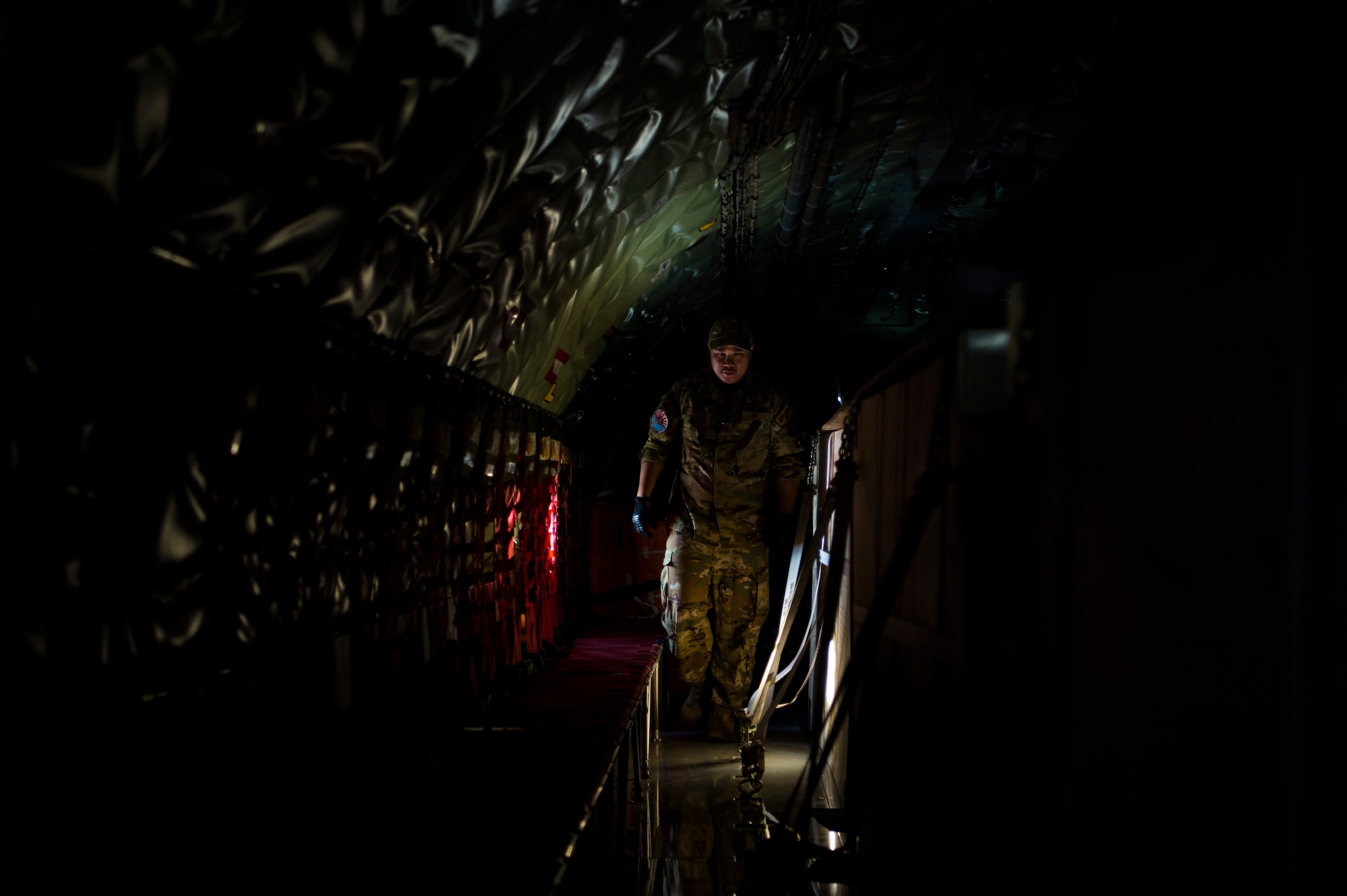 U.S. Air Force pilot assigned to the 28th Expeditionary Air Refueling Squadron performs a preflight inspection on a KC-135 Stratotanker at Al Udeid Air Base, Qatar, Jan. 14, 2020.