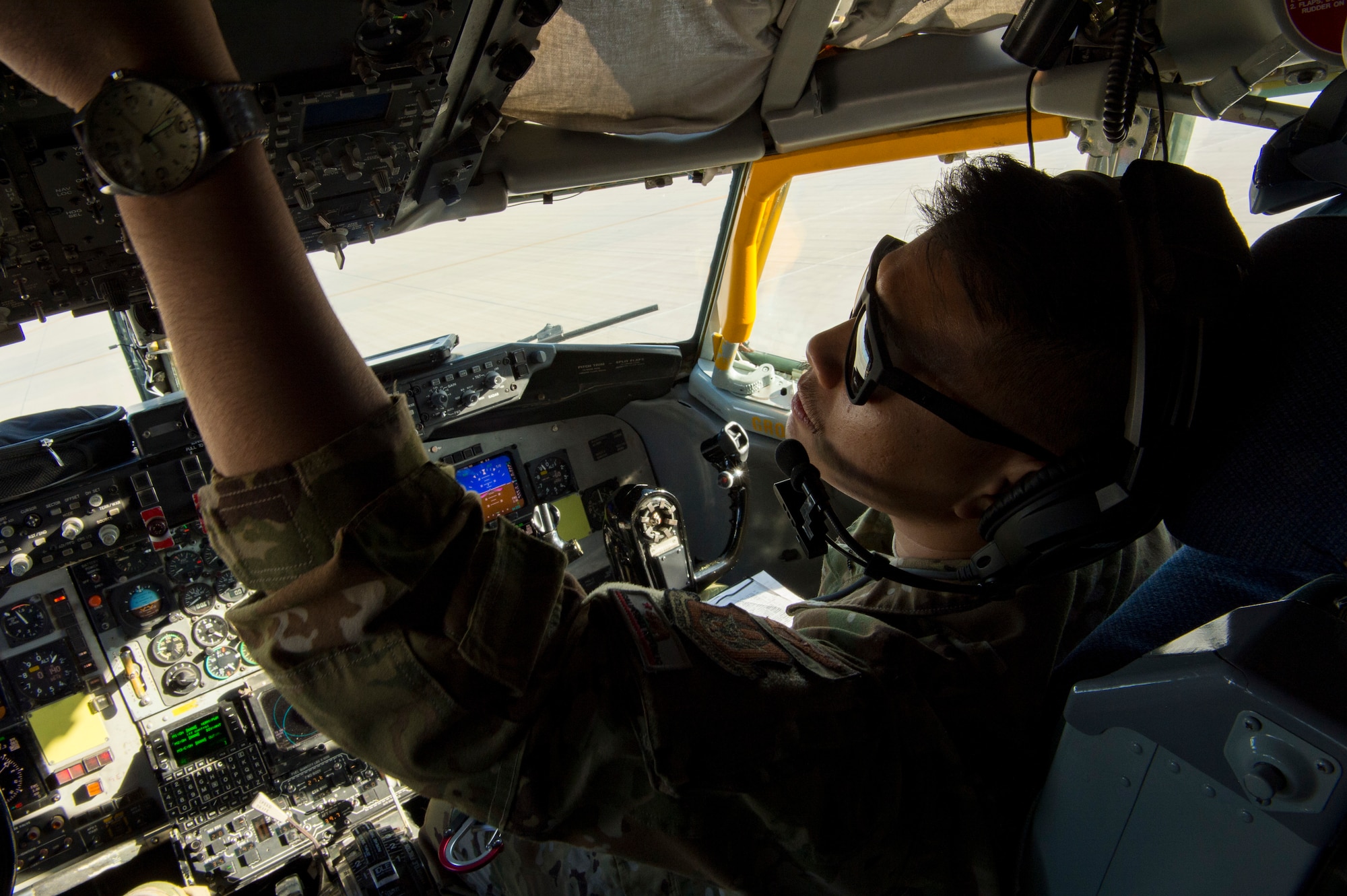 A U.S. Air Force pilot assigned to the 28th Expeditionary Air Refueling Squadron performs a preflight inspection on a KC-135 Stratotanker at Al Udeid Air Base, Qatar, Jan. 14, 2020.