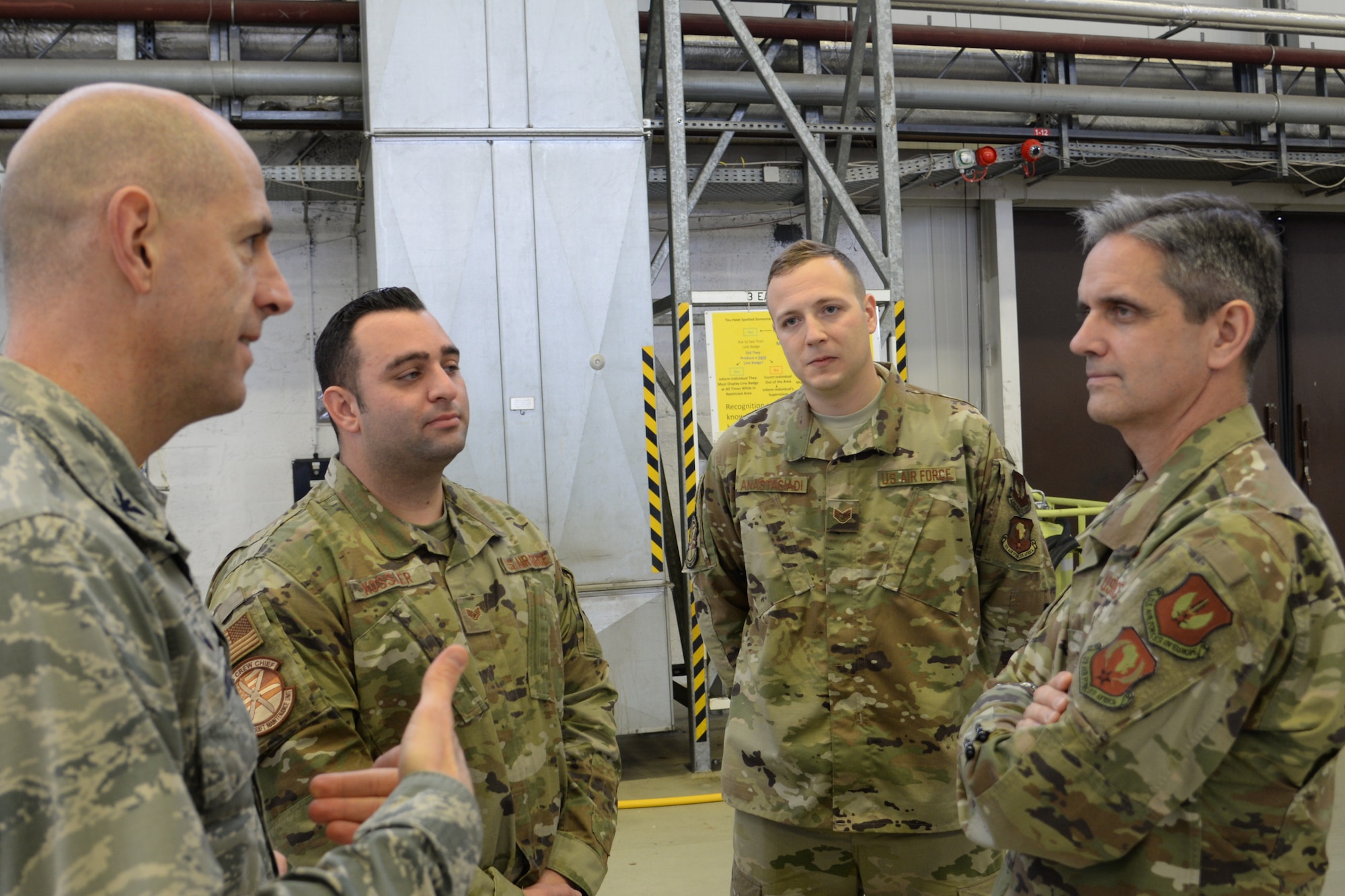 U.S. Air Force Col. John Knack, 86th Maintenance Group commander, far-left, meets Lt. Gen. Steven Basham, right, U.S. Air Forces in Europe-Air Forces Africa deputy commander, during a capabilities tour at Ramstein Air Base, Jan. 17,  2020. Basham listened to how the group operates, and also took suggestions on how to manage future expectations based on current capabilities.
