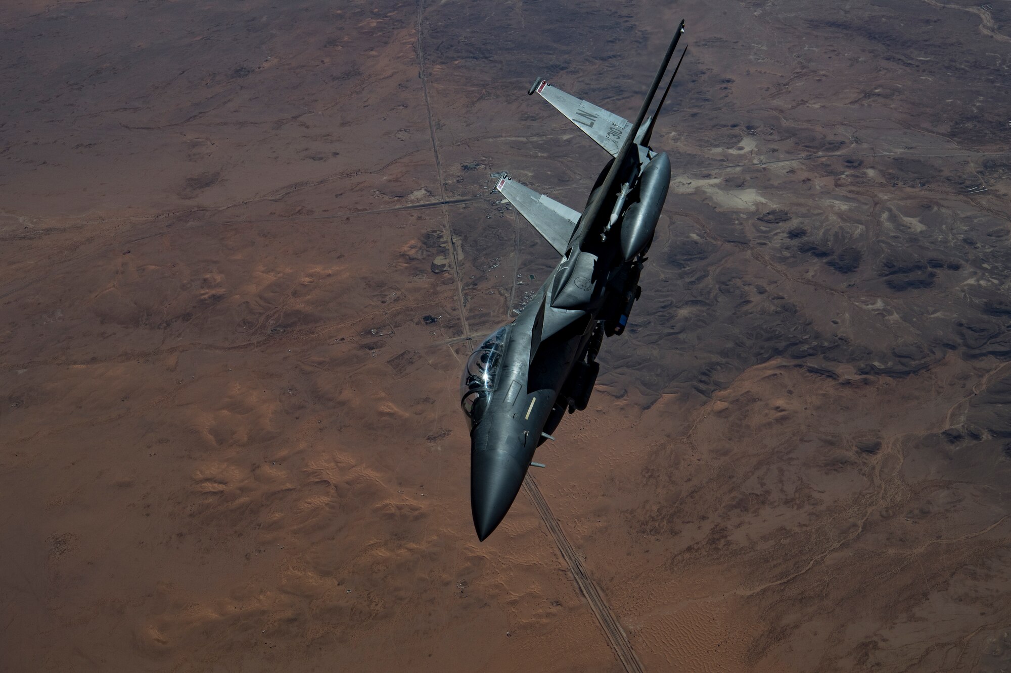 A U.S. Air Force F-15E Strike Eagle assigned to the 494th Expeditionary Fighter Squadron flies above the U.S. Central Command area of responsibility, Jan. 13, 2020.