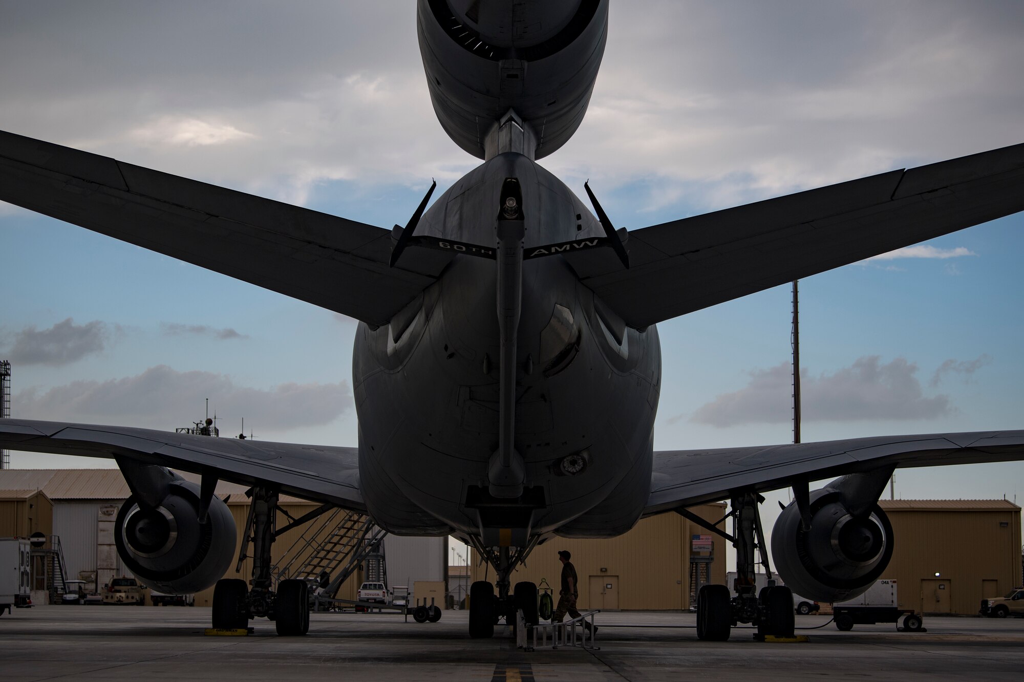 A U.S. Air Force KC-10 Extender flight engineer assigned to the 908th Expeditionary Air Refueling Squadron conducts preflight checks at Al Dhafra Air Base, United Arab Emirates, Jan. 11, 2020.