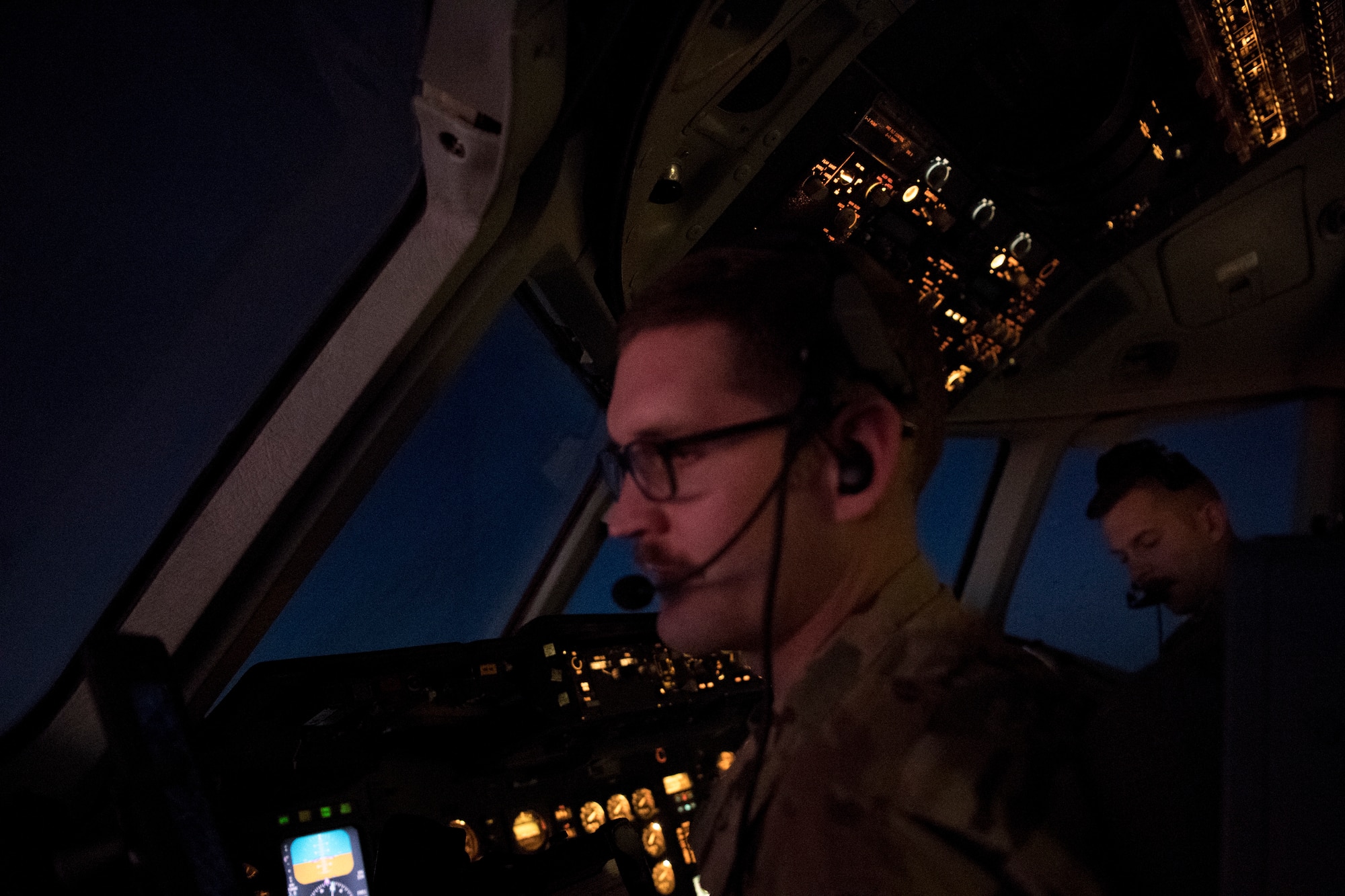 U.S. Air Force KC-10 Extender pilots assigned to the 908th Expeditionary Air Refueling Squadron adjust aircraft settings above the U.S. Central Command area of responsibility, Jan. 11, 2020.