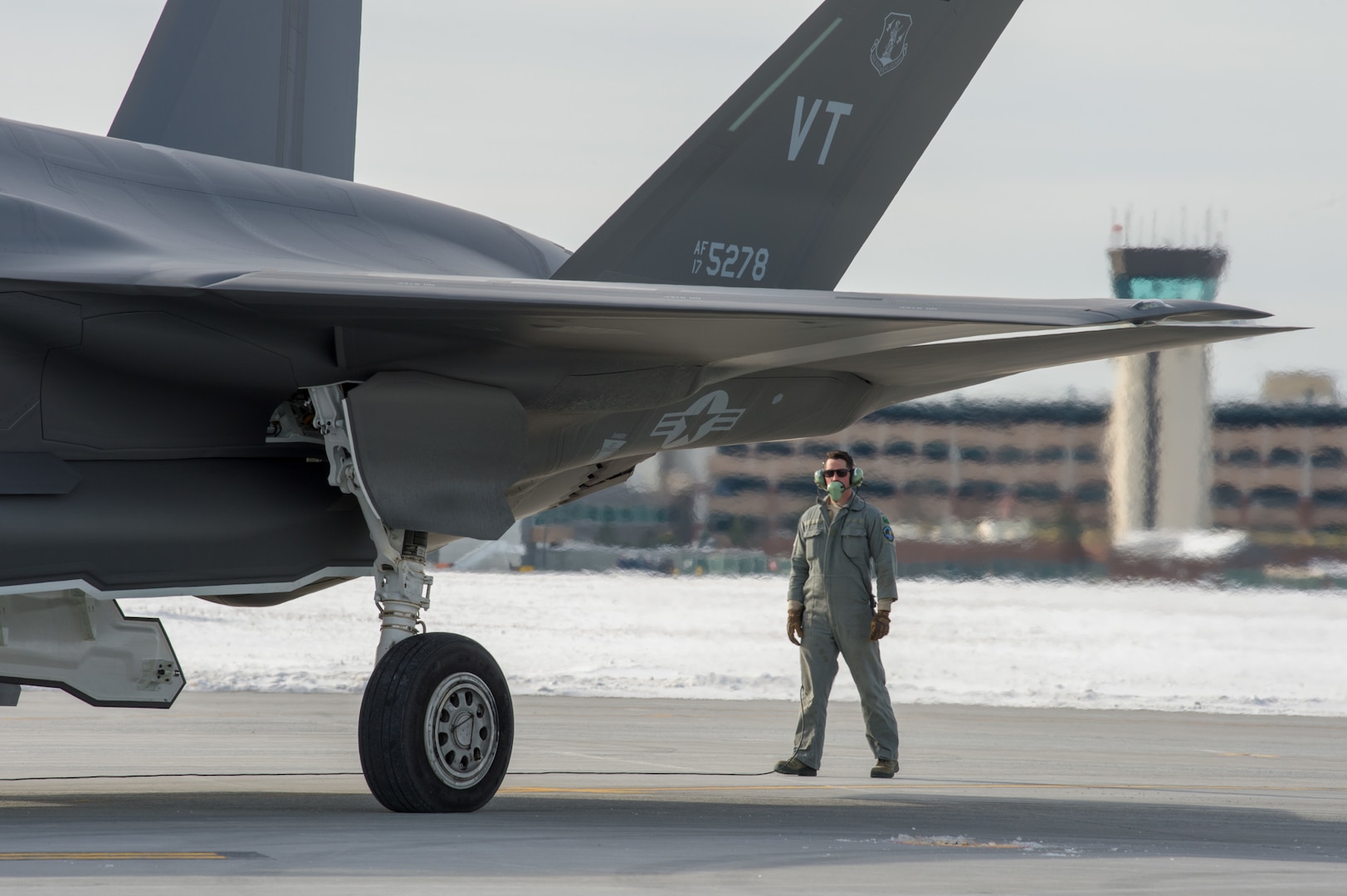 A crew chief assigned to the 158th Maintenance Group prepares an F-35 for departure to Eglin Air Force Base, Florida, from the Vermont Air National Guard Base, South Burlington, Vt., Jan. 23, 2020, for Southern Lightning training. More than 100 Airmen will fly and maintain F-35 operations at Eglin.