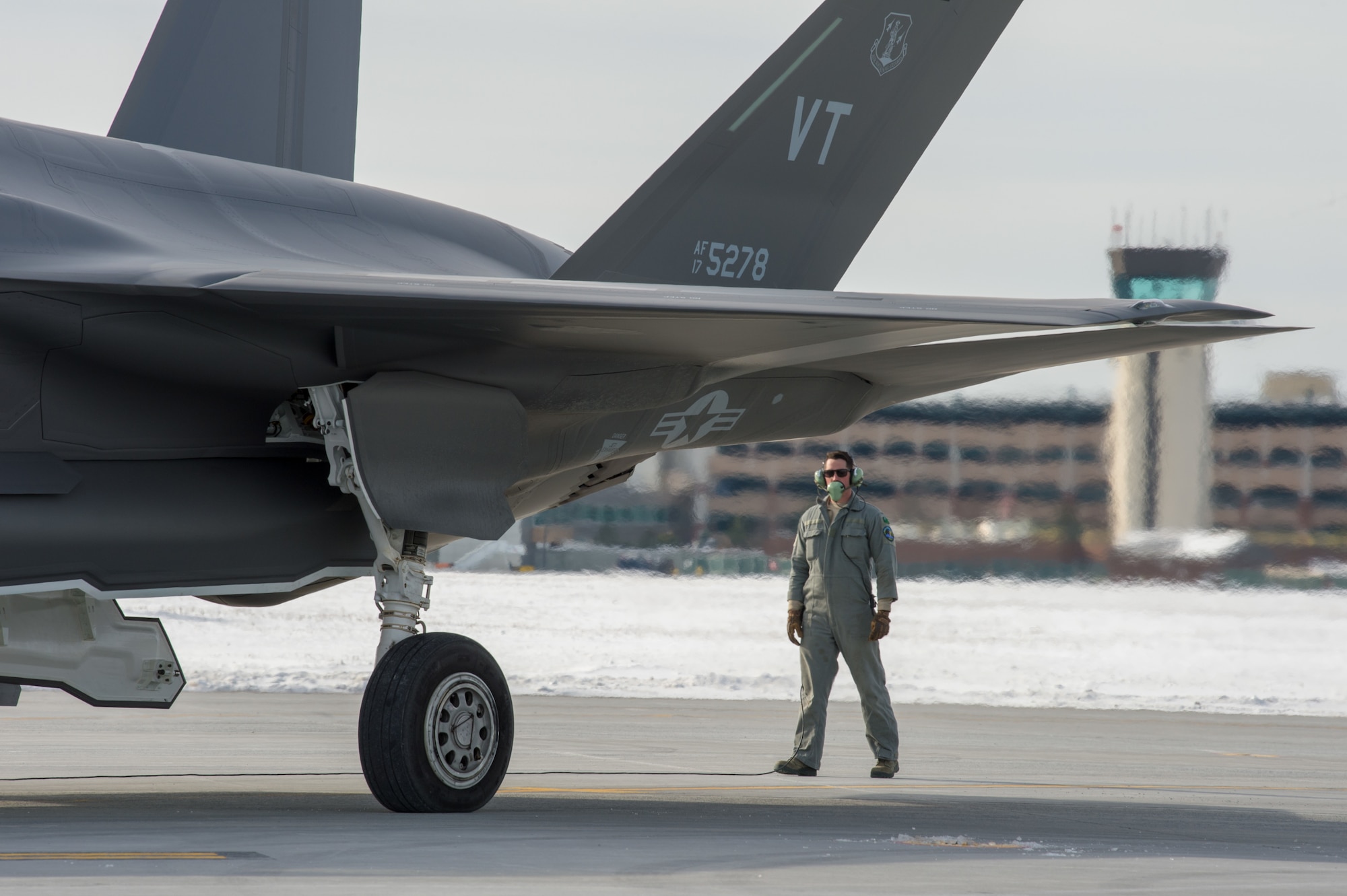 A U.S. Air Force crew chief, assigned to the 158th Fighter Wing's Maintenance Group, Vermont Air National Guard, prepares an F-35 Lightning II for departure from the Burlington Air National Guard Base, Vermont, Vt., Jan. 23, 2020. More than 100 158th FW Airmen traveled to Eglin Air Force Base, Florida, to participate in a training event, titled Southern Lightning, to support flying operations and develop their skills during the training. (U.S. Air National Guard photo by Miss Julie M. Shea)