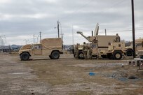 Members of the 63rd Expeditionary Signal Battalion set up communication equipment in preparation for Exercise Sudden Response (SR) 20.