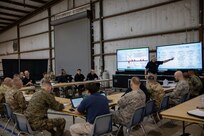 Members of the Joint Task Force Civil Support (JTF-CS) Crisis Action Team (CAT) brief U.S. Army Maj. Gen. William "Bill" Hall on the sequence of events in preparation for Exercise Sudden Response (SR) 20.