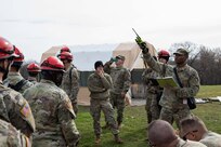 Army 1st Lt. Omotoyosi Oyedeji, 3rd Platoon leader, 68th Engineer Construction Company, briefs troops in preparation for a simulated urban rescue at Guvalle Water Treatment Plant, Austin, Texas, as part of Exercise Sudden Response (SR) 20.