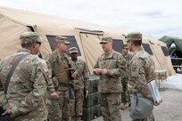 Joint Task Force Civil Support (JTF-CS) Commanding General U.S. Army Maj. Gen. William “Bill” Hall speaks with members of 546th Area Support Medical Company (ASMC) and 181st Chemical, Biological, Radiological, and Nuclear (CBRN) Company at Travis County Expo Center during Exercise Sudden Response (SR) 20.