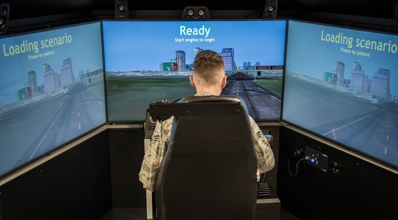 Airman drives simulator