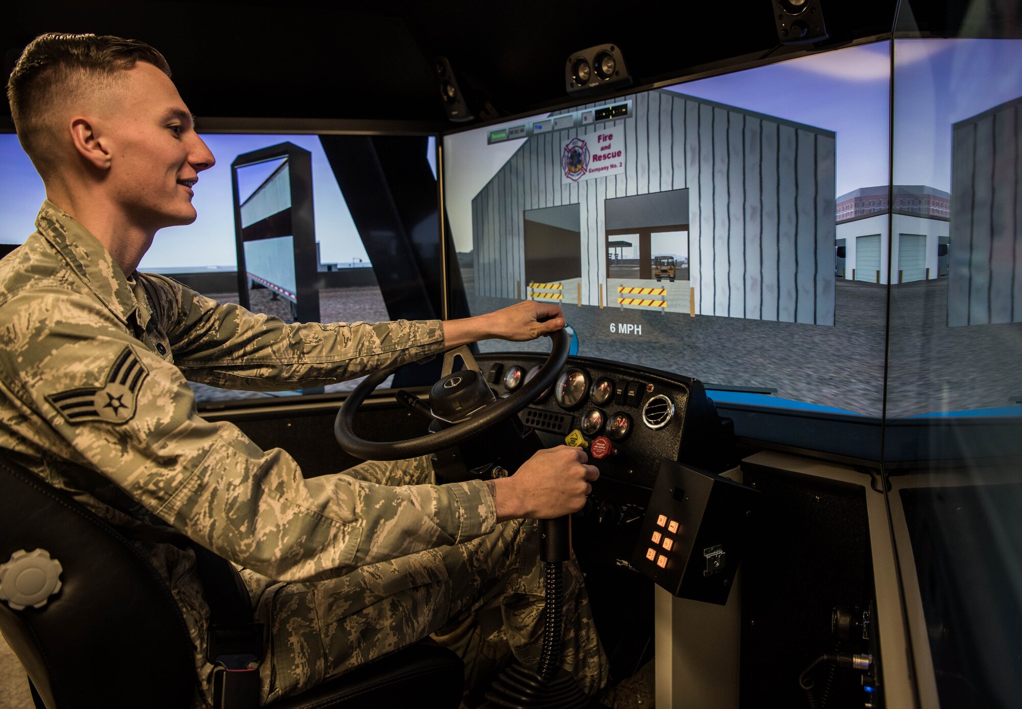 Airman drives simulator