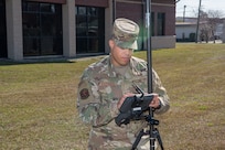 Staff Sgt. Aaron Williams, team lead for the 628th Civil Engineering Squadron’s Weapons Station geo-integrations office, tests a global navigation system receiver