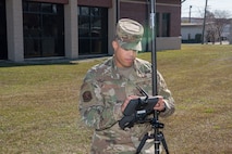 Staff Sgt. Aaron Williams, team lead for the 628th Civil Engineering Squadron’s Weapons Station geo-integrations office, tests a global navigation system receiver