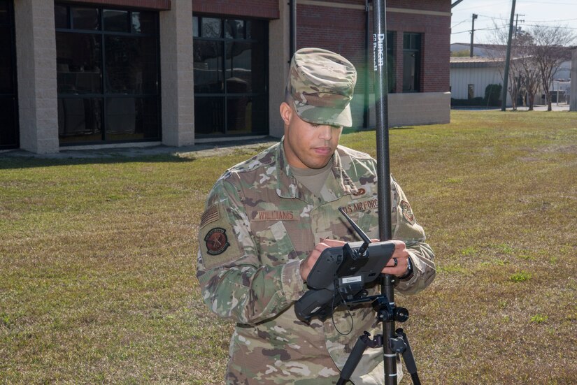 Staff Sgt. Aaron Williams, team lead for the 628th Civil Engineering Squadron’s Weapons Station geo-integrations office, tests a global navigation system receiver