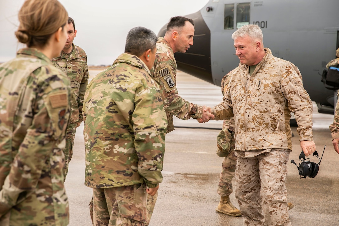 U.S. Marine Corps Gen. Kenneth F. McKenzie Jr., the commander of U.S. Central Command, right, visits Airmen assigned to the 332 Air Expeditionary Wing, Jan. 24, 2020. McKenzie visited the USCENTCOM Area of Responsibility to discuss security and stability in the region with forward deployed service members. (U.S. Marine Corps photo by Sgt. Roderick Jacquote)