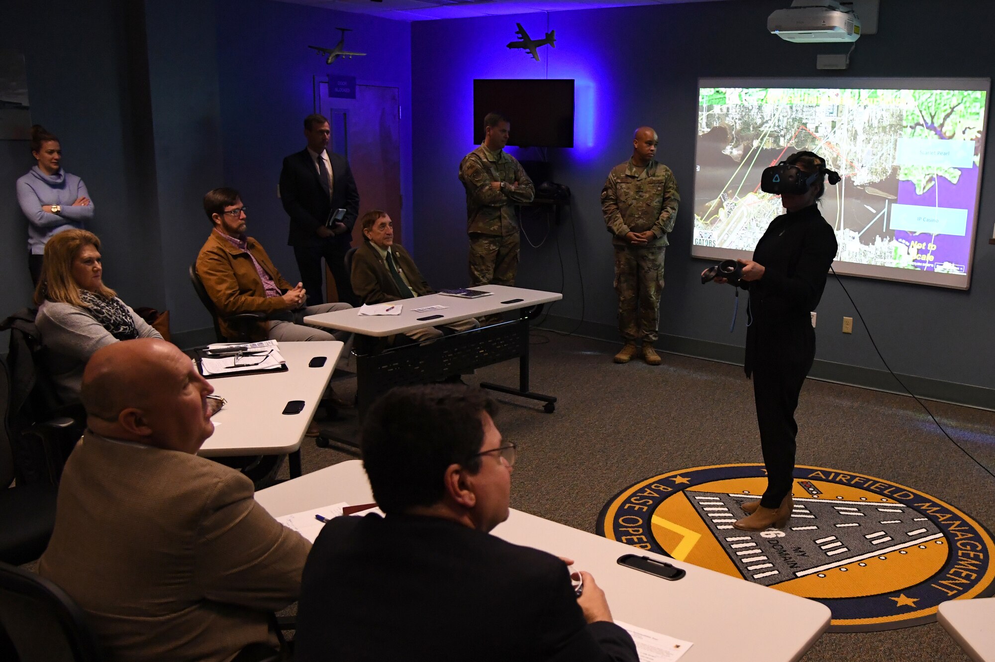 Leslie Robertson, D'Iberville project coordinator, participates in an airfield management virtual reality demonstration during the airspace sustainability tour inside Cody Hall at Keesler Air Force Base, Mississippi, Jan. 23, 2020. Keesler hosted the community engagement for civic leaders to discuss Keesler's flying mission requirements in order to create processes which inform key decision makers regarding local development, and to ensure compatible economic growth for the surrounding communities. (U.S. Air Force photo by Kemberly Groue)