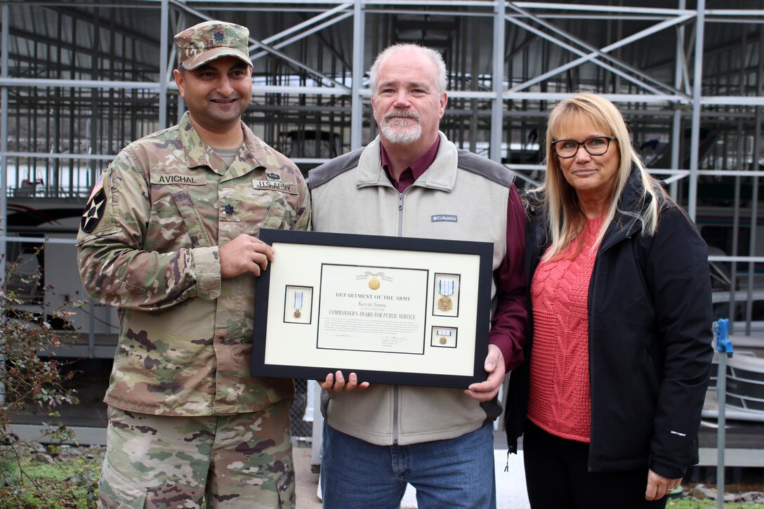 Lt. Col. Sonny B. Avichal, U.S. Army Corps of Engineers Nashville District commander, poses with Kevin and Donna Jones Jan. 24, 2020 at Wildwood Resort and Marina at Cordell Hull Lake in Granville, Tennessee. The commander presented the Department of the Army Commander’s Award for Public Service for his actions to rescue a patron whose vehicle entered the water at the boat ramp Aug. 5, 2019. (USACE photo by Ashley Webster)