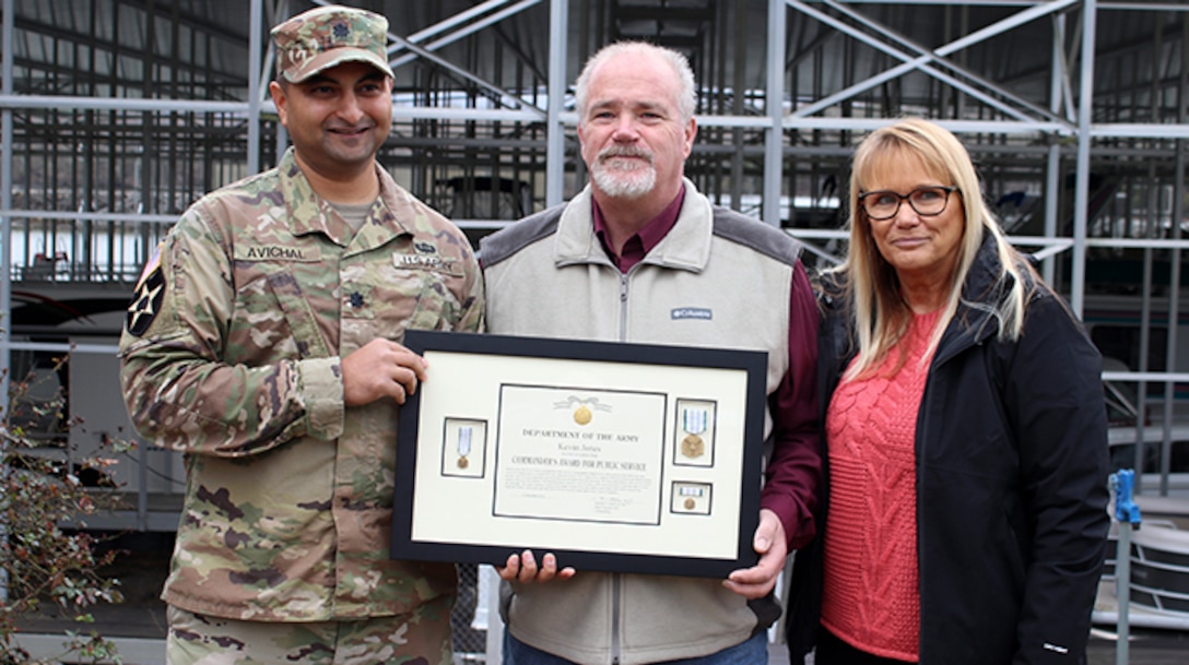 Lt. Col. Sonny B. Avichal, U.S. Army Corps of Engineers Nashville District commander, poses with Kevin and Donna Jones Jan. 24, 2020 at Wildwood Resort and Marina at Cordell Hull Lake in Granville, Tennessee. The commander presented the Department of the Army Commander’s Award for Public Service for his actions to rescue a patron whose vehicle entered the water at the boat ramp Aug. 5, 2019. (USACE photo by Ashley Webster)