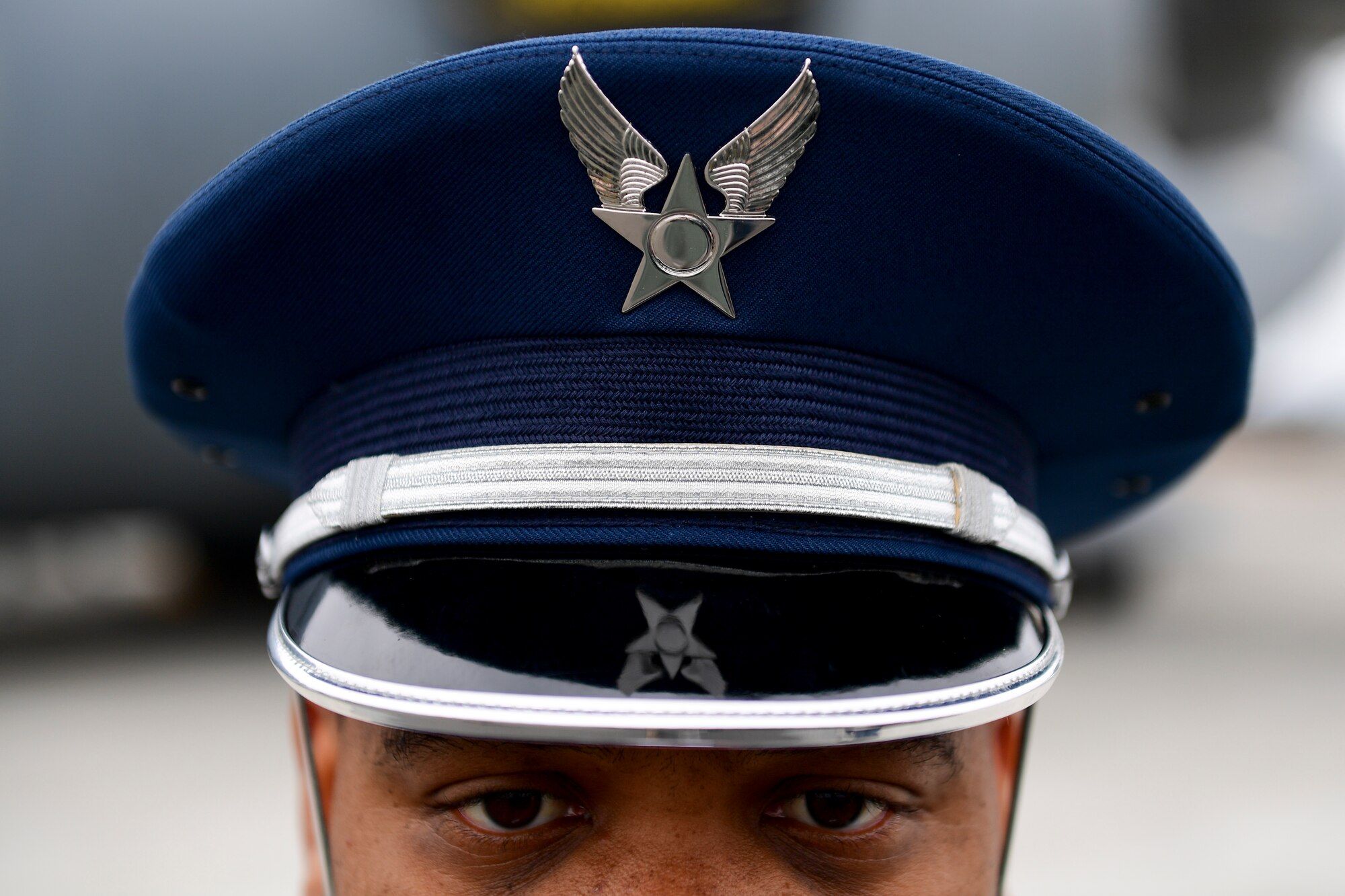 Tech Sgt. Diontae Walker, 911th Airlift Wing Honor Guard ceremonial guardsman, prepares to perform duties at a chief induction ceremony at the Pittsburgh International Airport Air Reserve Station, Pennsylvania, Jan. 12, 2020.