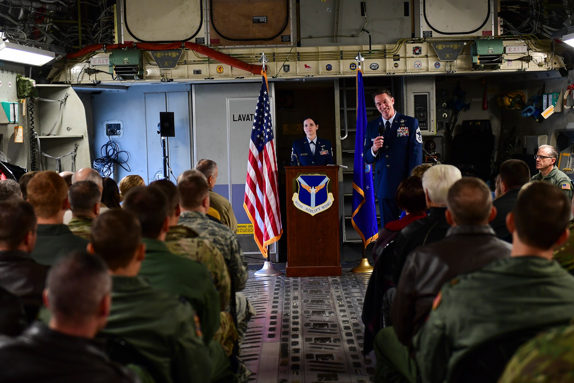 Chief Master Sgt. Marshall Martindale, 758th Airlift Squadron loadmaster, talks to members from the 911th Airlift Wing during his chief induction ceremony at the Pittsburgh International Airport Air Reserve Station, Jan. 12, 2020.