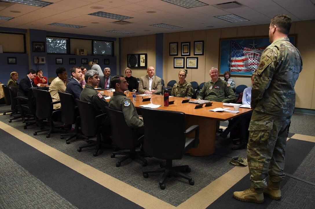 U.S. Air Force Col. Lance Burnett, 81st Training Wing vice commander, delivers the 81st TRW mission overview to guests during the airspace sustainability tour inside Cody Hall at Keesler Air Force Base, Mississippi, Jan. 23, 2019. Keesler hosted the community engagement for civic leaders to discuss Keesler's flying mission requirements in order to create processes which informs key decision makers regarding local development and to ensure compatible economic growth for the surrounding communities. (U.S. Air Force photo by Kemberly Groue)