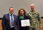 Naval Surface Warfare Center, Philadelphia Division (NSWCPD) Commanding Officer Capt. Dana Simon (right) and Technical Director Tom Perotti (left) presented Dr. Terri A. Dickerson, Director, Civil Rights Directorate, U.S. Coast Guard, with a certificate of appreciation following her remarks at NSWCPD’s Dr. Martin Luther King Jr. Birthday Observance on Jan. 22. Dickerson shared her story from being a member of the first class to integrate the New Orleans Catholic school system to a member of the Senior Executive Service (SES). (U.S. Navy Photo by Kirsten. St. Peter/Released)