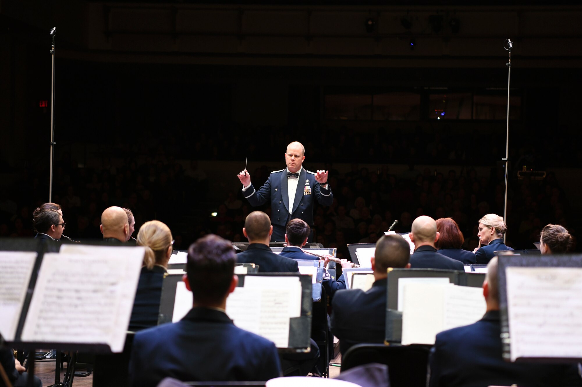 Maj. Jason Plosch, U.S. Air Force Band associate conductor, leads the band during the Guest Concert Series at the Rachel M. Schlesinger Concert Hall and Arts Center in Alexandria, Va., Jan. 23, 2020. The U.S. Air Force Band has two more Guest Artist Series concerts slated to be performed this year. (U.S. Air Force photo by Airman 1st Class Spencer Slocum)
