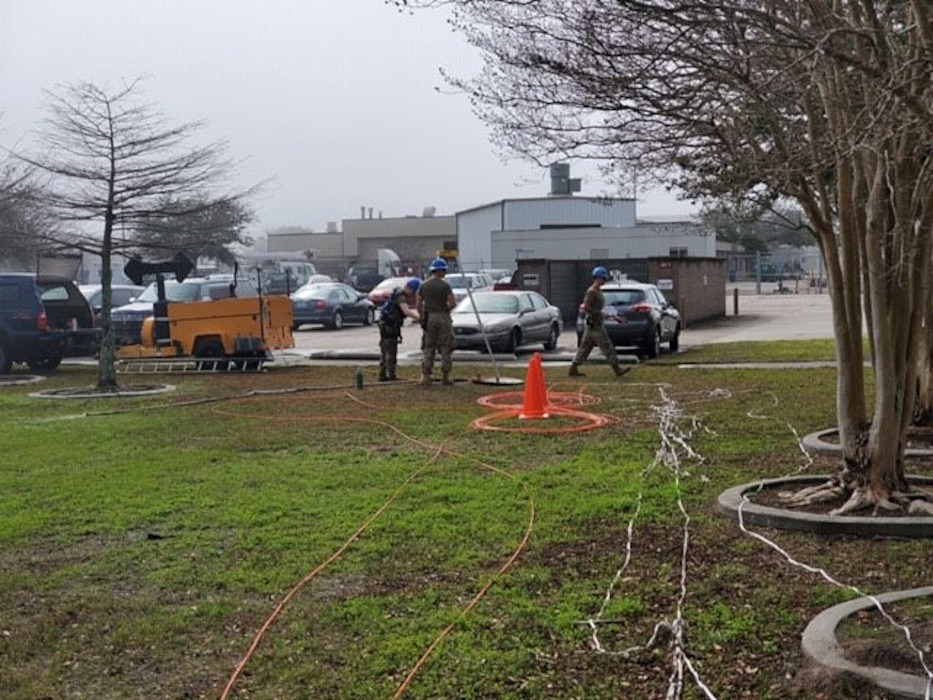 U.S. Air Force Airmen prepare cable for installation at Keesler Air Force Base, Mississippi, Jan. 14, 2020. Keesler is the first in the Air Force to use the new blown fiber installation. Blown fiber installation is a new cable installing process that cuts the timeline on installation from seven to 10 days to three days. (Courtesy photo by Tech. Sgt. Bryan Williams)