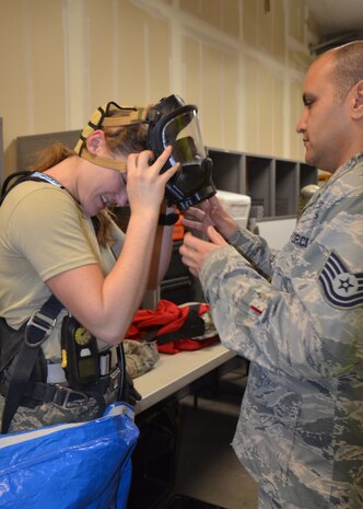 2nd Lt. Rebecca Smith, 9th Aerospace Medicine Squadron Deputy Flight Commander of Bioenvironmental Engineering, removes her mask after conducting HazMat ID training Jan. 24, 2020 at Beale Air Force Base, California (Courtesy U.S. Air Force photo by Capt. Jenell Brown)