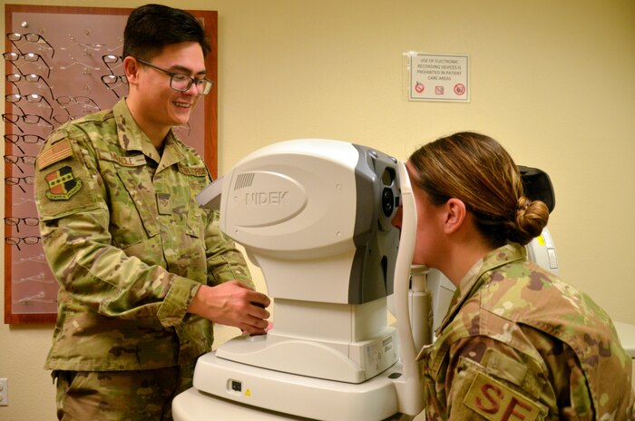 Senior Airman Christopher Miracle, 9th Aerospace Medicine Squadron optometry technician, pre-screens a patient prior to an eye examination Jan. 23, 2020 at Beale Air Force Base, California. (Courtesy U.S. Air Force photo by Capt. Jenell Brown)