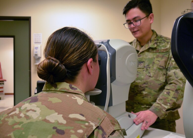 Senior Airman Christopher Miracle, 9th Aerospace Medicine Squadron optometry technician, pre-screens a patient prior to an eye examination Jan. 23, 2020 at Beale Air Force Base, California. (Courtesy U.S. Air Force photo by Capt. Jenell Brown)