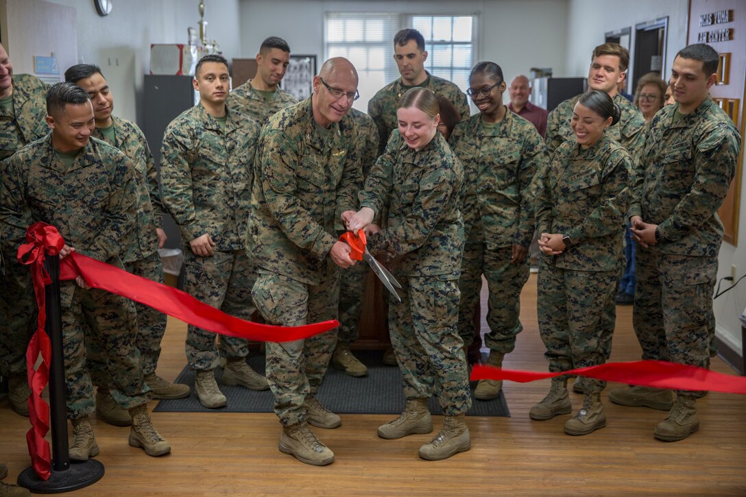 arine Corps Air Station Yuma Commanding Officer, Col. David Suggs, alongside the legal center personnel, cuts the ribbon in honor of the official opening of the station tax center aboard MCAS Yuma, Ariz., Jan. 15, 2020. (U.S. Marine Corps photo by Lance Cpl John Hall)