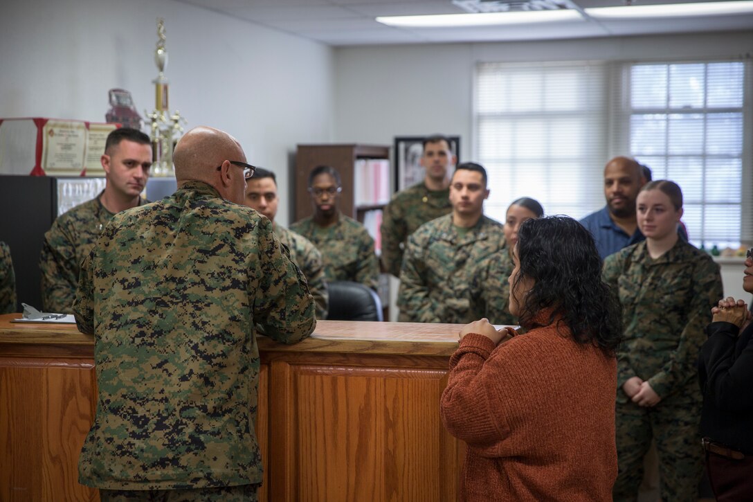 Marine Corps Air Station Yuma Commanding Officer, Col. David Suggs, alongside the legal center personnel, cuts the ribbon in honor of the official opening of the station tax center aboard MCAS Yuma, Ariz., Jan. 15, 2020. (U.S. Marine Corps photo by Lance Cpl John Hall)