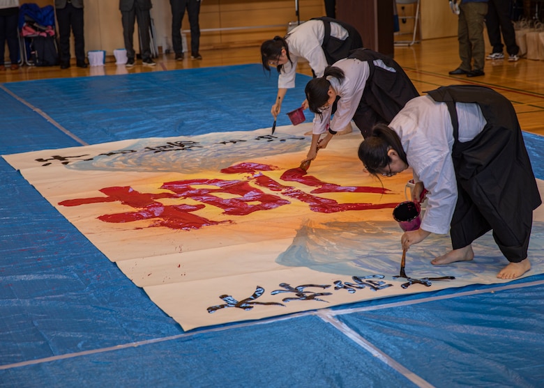 Marine Corps Air Station Iwakuni and Japanese residents, students, and leaders take part in kakizome, at Waki Elementary School, Waki Town, Japan, Jan. 11, 2019. Kakizome is the first calligraphy writing of the year that sets the writers goals for the New Year. (U.S. Marine Corps photo by Lance Cpl. Triton Lai)