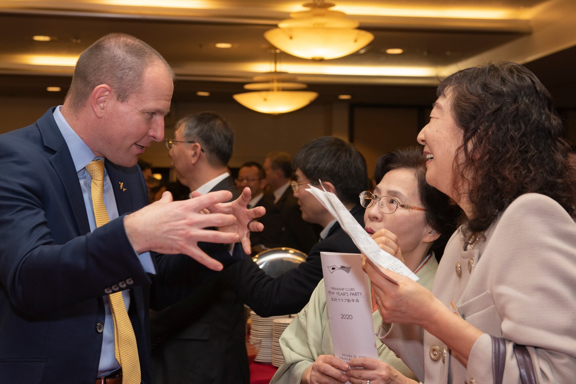 Lt. Col. Donavan Laskey, 374th Operations Support Squadron commander, speaks with attendees during the U.S.-Japan Joint New Year’s Party, Jan. 25, 2020, at Yokota Air Base, Japan.