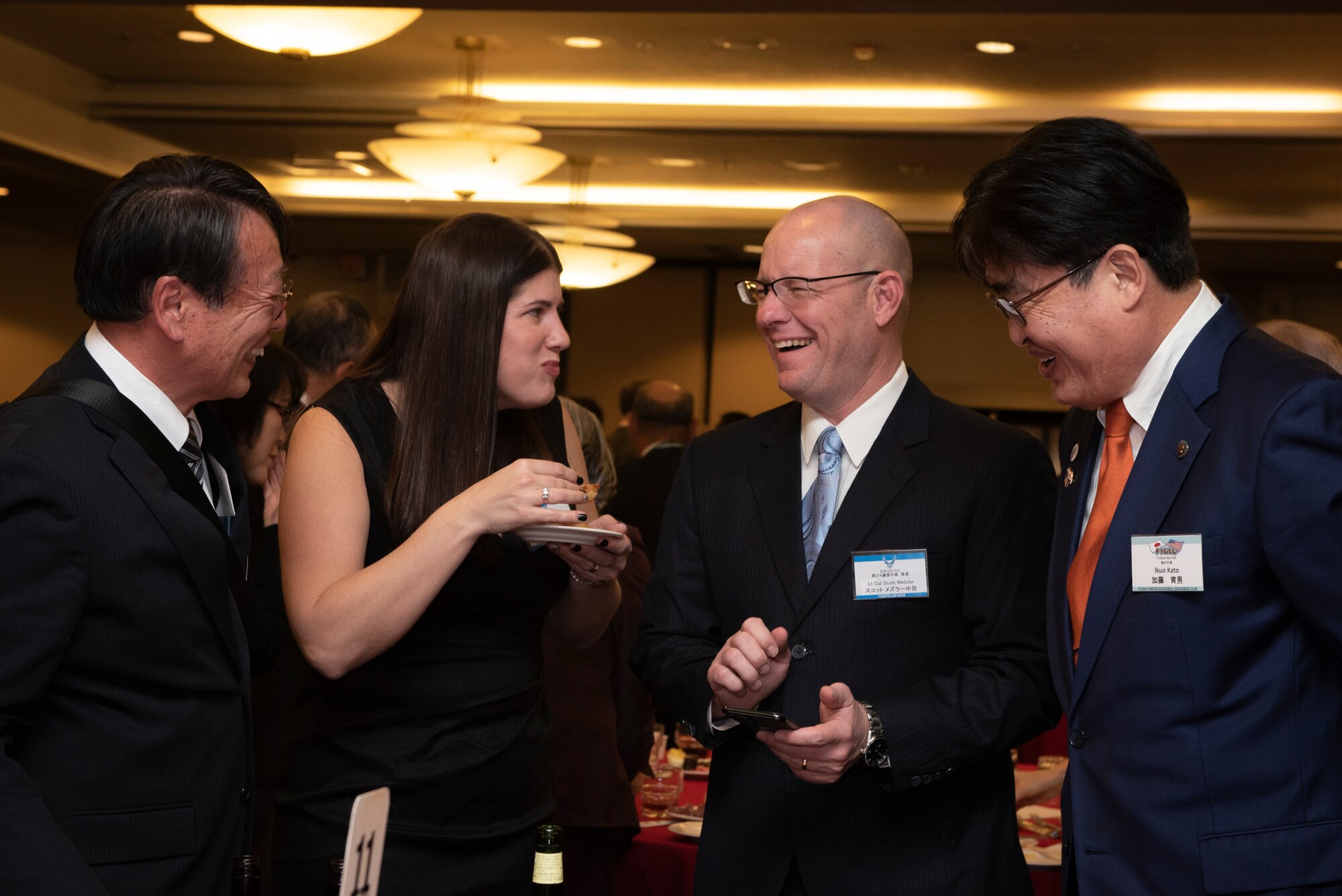 Lt. Col. Scott Metzler, 374th Communications Squadron commander, and his wife Jennie talk to attendees during the U.S.-Japan Joint New Year’s Party, Jan. 25, 2020, at Yokota Air Base, Japan.