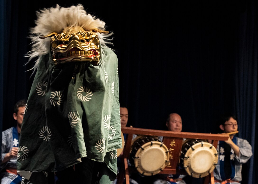 A member of Ome-Honcho Hayashiren performs a Japanese traditional dance to the music of Ohayashi, a group of performers who provide musical accompaniment for traditional Japanese performing arts, during the U.S.-Japan Joint New Year’s Party, Jan. 25, 2020, at Yokota Air Base, Japan.