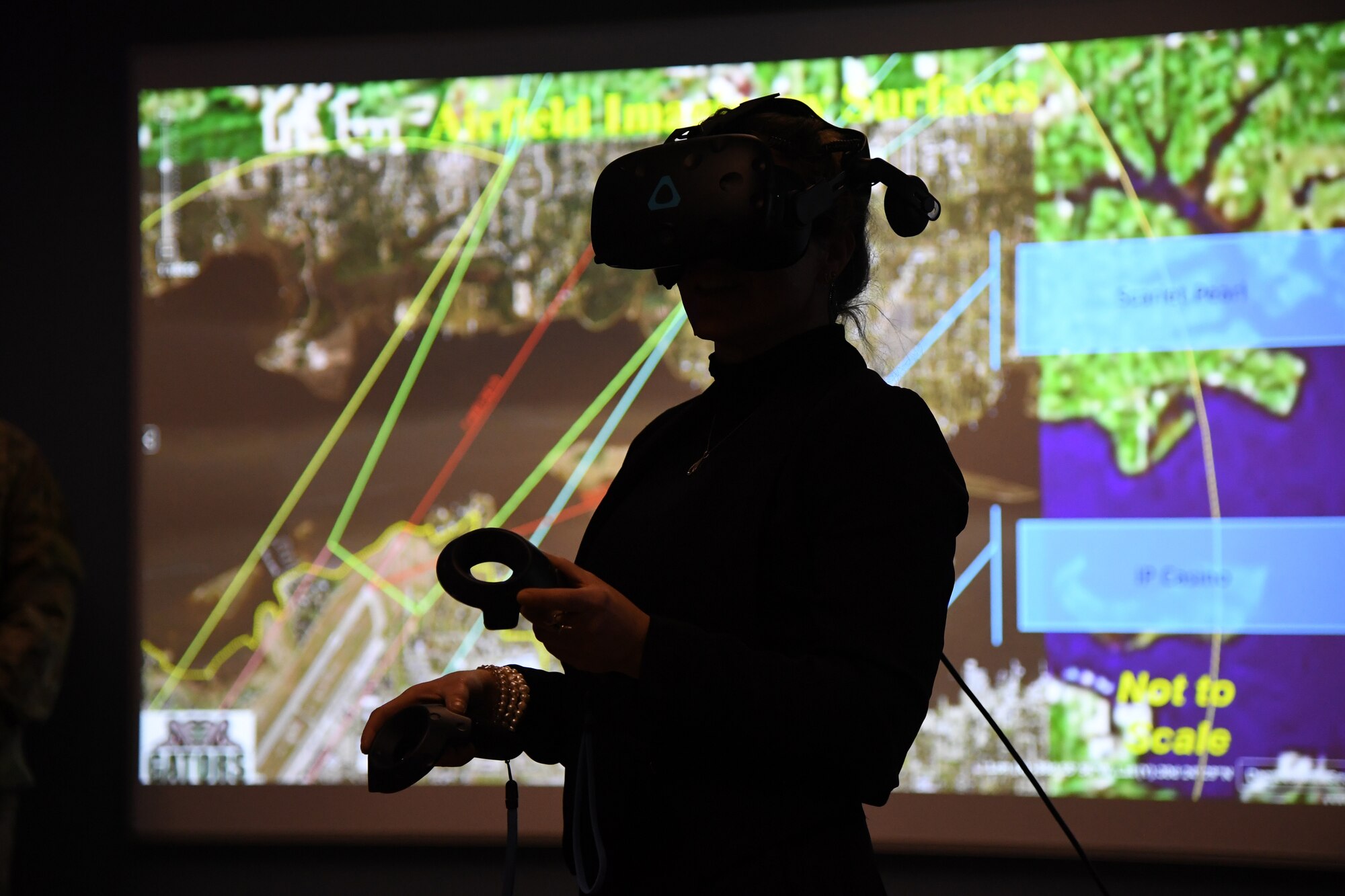 Leslie Robertson, D'Iberville project coordinator, participates in an airfield management virtual reality demonstration during the airspace sustainability tour inside Cody Hall at Keesler Air Force Base, Mississippi, Jan. 23, 2020. Keesler hosted the community engagement for civic leaders to discuss Keesler's flying mission requirements in order to create processes which inform key decision makers regarding local development, and to ensure compatible economic growth for the surrounding communities. (U.S. Air Force photo by Kemberly Groue)