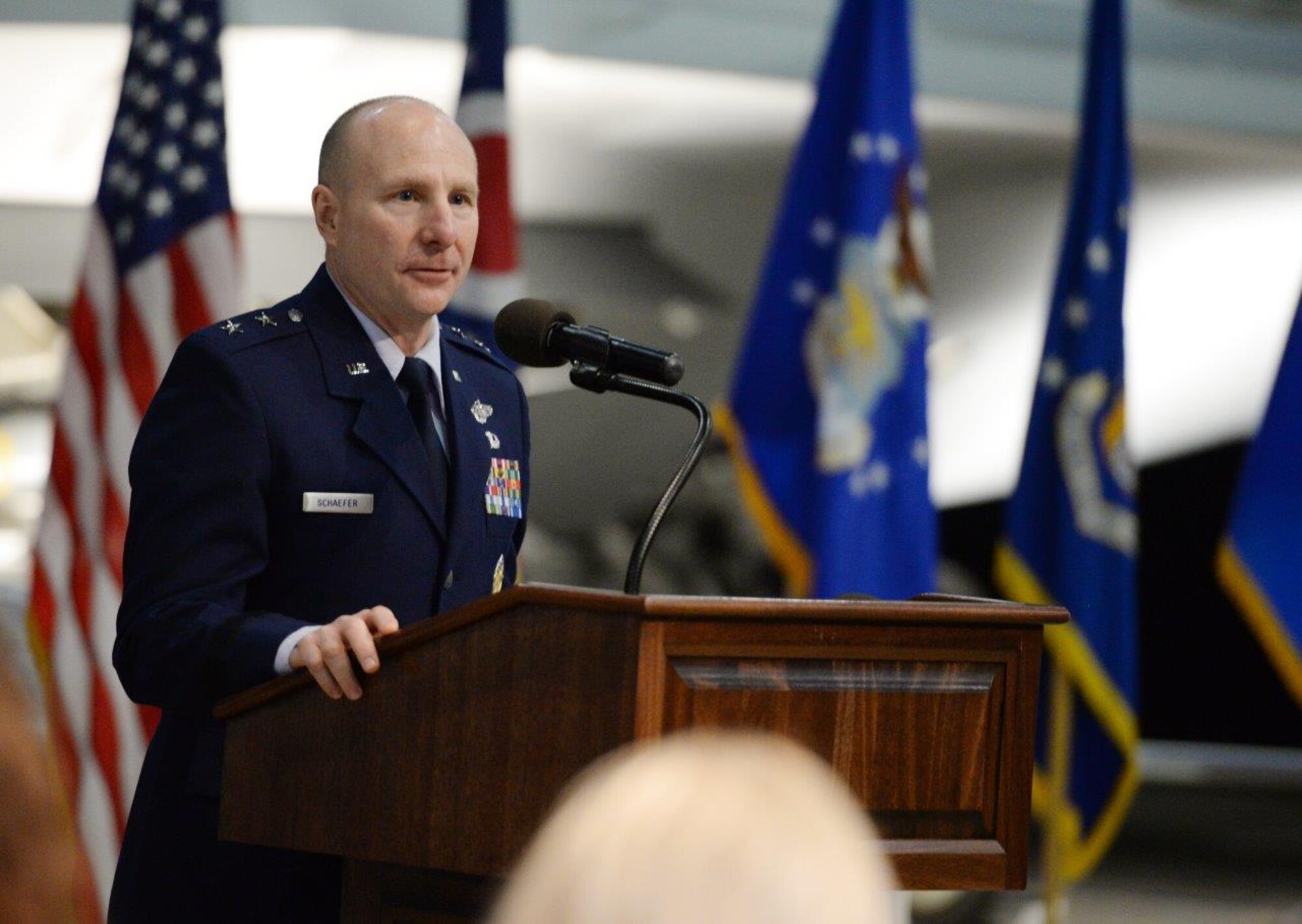 U.S. Air Force Maj. Gen. Carl Schaefer, Air Force Materiel Command vice commander, delivers remarks before the signing of Senate Bill 7 into law by Ohio Governor Mike DeWine at the National Museum of the United States Air Force, Wright-Patterson Air Force Base, Ohio, Jan. 27, 2020. The bill mandates Ohio agencies to issue licenses or certificates to qualifying military members and their spouses. (U.S. Air Force photo by Wesley Farnsworth)