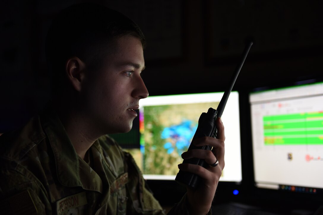 Senior Airman Corbyn Peterson, 341st Operational Support Squadron weather forecaster, answers a radio device Jan. 9, 2020, at Malmstrom Air Force Base, Mont.