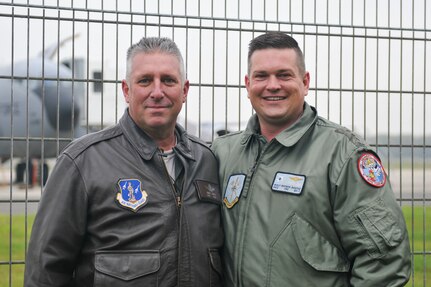 U.S. Air Force Lt. Col. Troy Smith poses with German Air Force Capt. Wolf-Soren Radke Nov. 19, 2019, at NATO Air Base Geilenkirchen. Smith and Radke are continuing a friendship their fathers, who were also military members, started years ago.