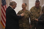 Minnesota National Guard Soldier Katie Blackwell honored her family's legacy of military service dating back to the American Revolution by having her grandfather, Ford Elliott, help to promote her to the rank of sergeant major on his 90th birthday at a January 2020 ceremony in Champlin, Minn.