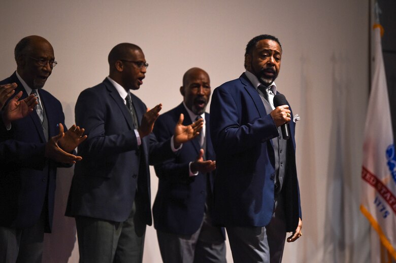 The Joint Base Lewis-McChord (JBLM) Grace Gospel Service Men’s Choir performs at the Martin Luther King Jr Day observance event in the McChord Theater on JBLM, Wash., Jan. 24, 2020. The observance event for Martin Luther King Jr. Day was attended by both Airmen and Soldiers and was intended to reflect on the meaning of the holiday and Martin Luther King Jr.’s influence and relevance. (U.S. Air Force photo by Airman 1st Class Mikayla Heineck)