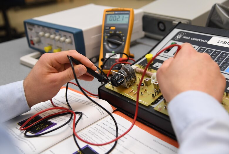 U.S. Air Force Airman Blanford Boston, 338th Training Squadron student, tests amplitude modulation circuits during the Cyber Space Support Common Course inside Dolan Hall at Keesler Air Force Base, Mississippi, Jan. 27, 2020. Boston graduated with perfect scores throughout the course. He will continue his follow-on training in the radio frequency transmission systems course at Keesler AFB. (U.S. Air Force photo by Kemberly Groue)