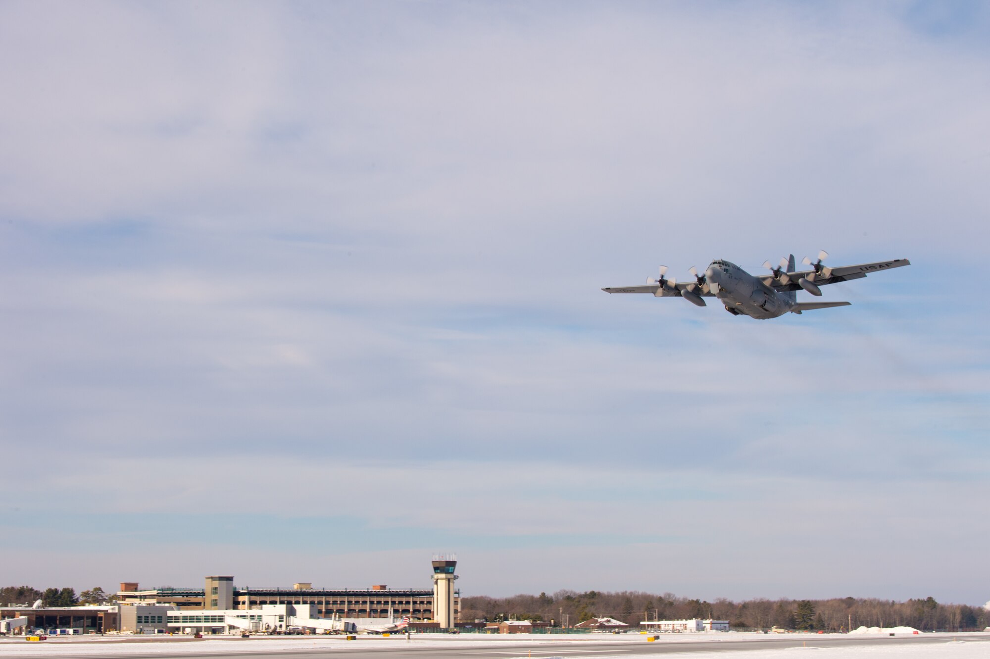 Members assigned to the 158th Fighter Wing board a C-130 assigned to the Montana Air National Guard