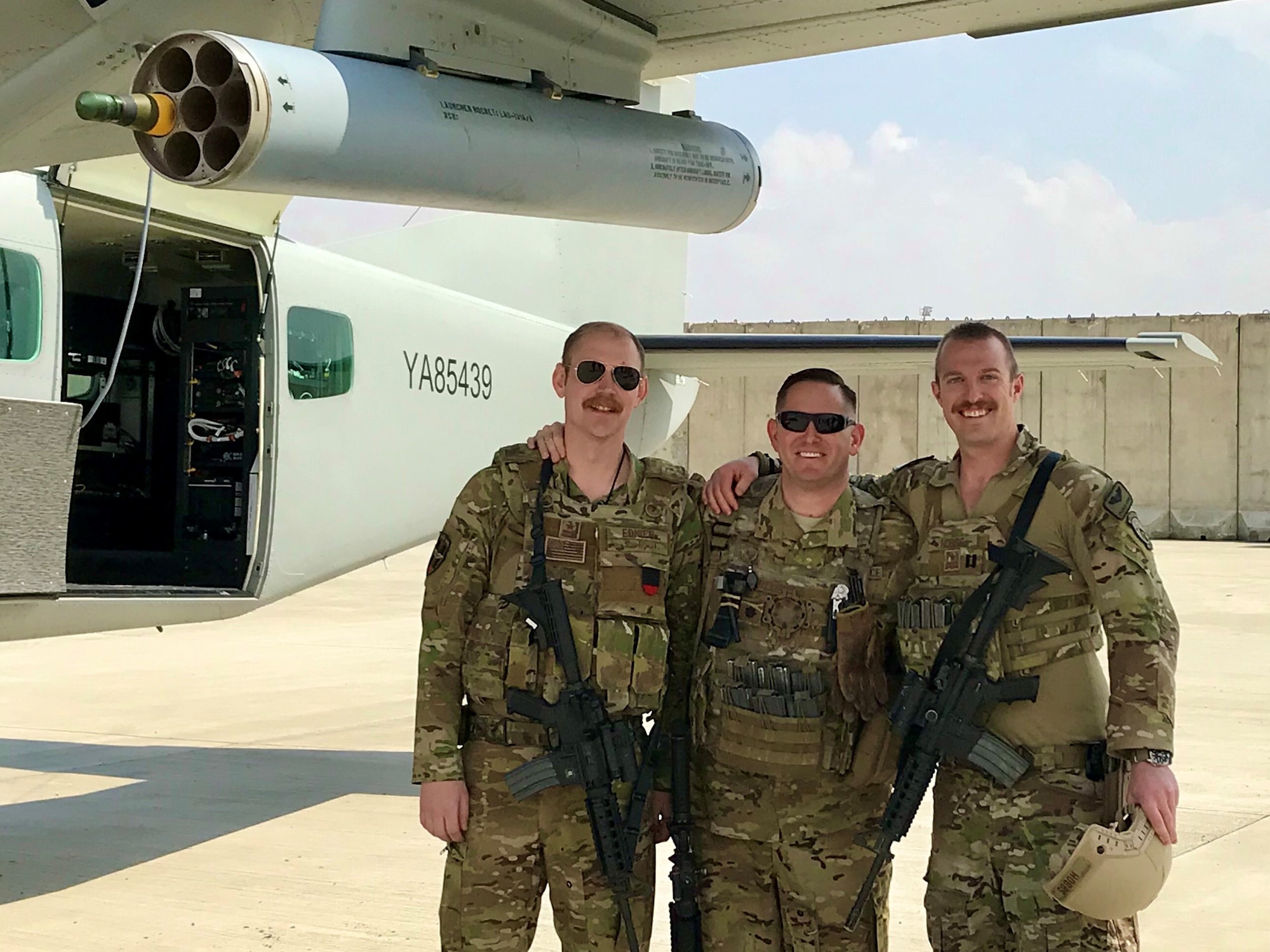 U.S. Air Force Lt. Col. Carl Miller (center), 538th Air Expeditionary Advisory Squadron commander, with U.S. Air Force Capt. Adam Ediger (left) and Capt. Charlie Hobbs at Hamid Karzai International Airport in Kabul, Afghanistan in May 2019. Miller was named a 2019 Lance P. Sijan United States Air Force Leadership Award winner in the senior officer category. (Courtesy Photo)