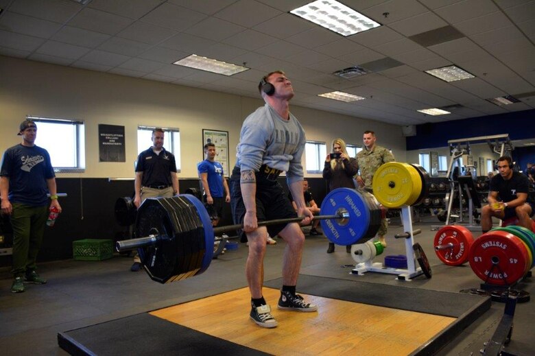 Staff Sgt. Ian Sayler, 1st Space Operations Squadron, rises as he attempts to deadlift 495 Jan. 24, 2020 at Schriever Air Force Base Fitness Center. Sayler’s 495-pound lift was his highest of the competition and third heaviest among nine male lifters. (U.S. Air Force photo by Joe Montoya)