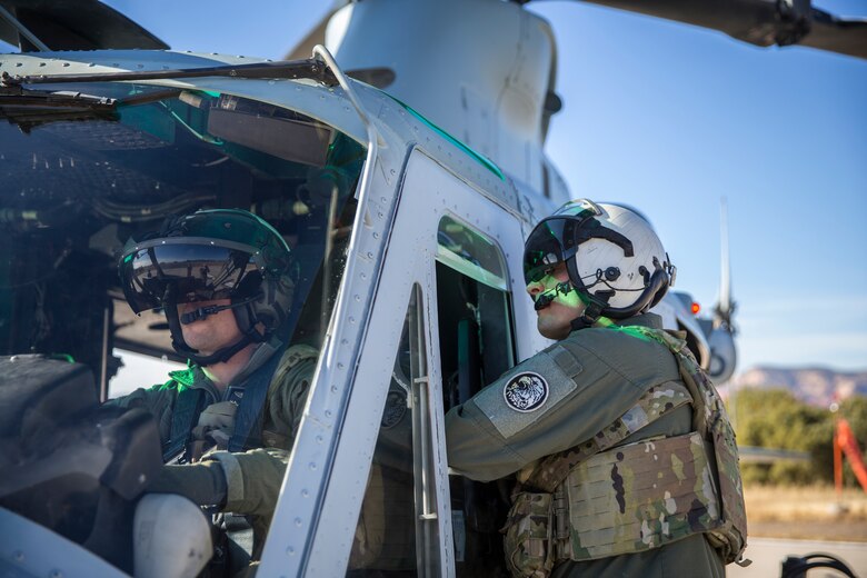 U.S. Marines with Marine Test and Evaluation Squadron (VMX) 1 conduct aerial training in a UH-1Y over the Sonoran Desert, Az., on Nov. 15, 2019. VMX-1 is an operational test squadron that tests  multiple aircraft to allow the continuation of improving the safety, reliability, and lethality of the aircraft. (U.S. Marine Corps photo by Lance Cpl John Hall)
