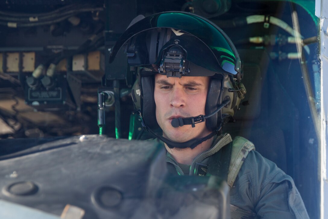 U.S. Marines with Marine Test and Evaluation Squadron (VMX) 1 conduct aerial training in a UH-1Y over the Sonoran Desert, Az., on Nov. 15, 2019. VMX-1 is an operational test squadron that tests  multiple aircraft to allow the continuation of improving the safety, reliability, and lethality of the aircraft. (U.S. Marine Corps photo by Lance Cpl John Hall)