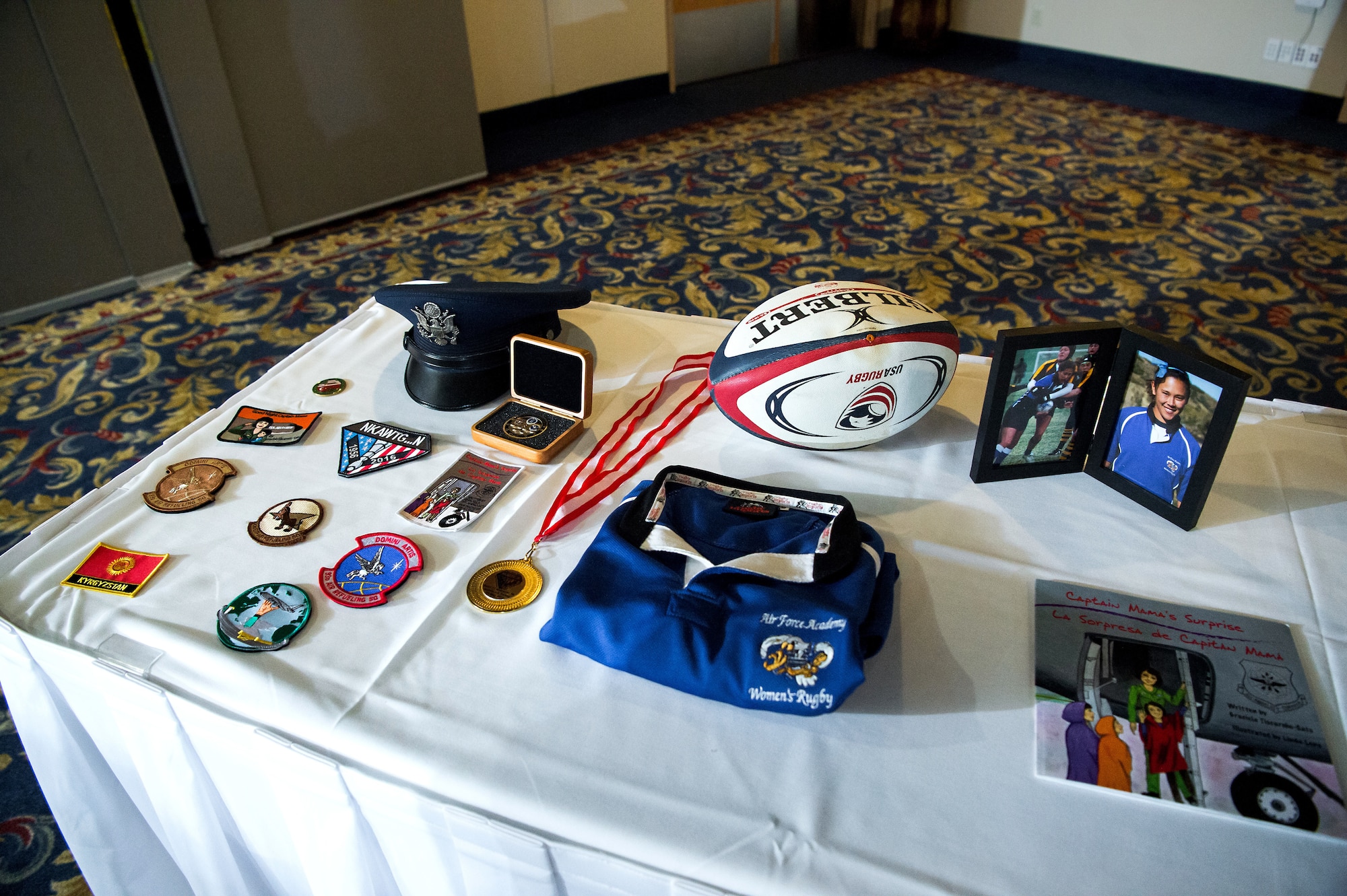 Cadet candidates with the U.S. Air Force Academy Preparatory School display mementos from the late Capt. Victoria A. “Tori” Pinckney’s life during the 2020 Exemplar Dinner honoring her in the Falcon Club at the U.S. Air Force Academy, Colo., Jan. 24, 2020. Pinckney was a 2008 Academy graduate and played on the Women’s Rugby team during her tenure with Cadet Squadron 15 in Vandenberg Hall. (U.S. Air Force photo by Trevor Cokley)