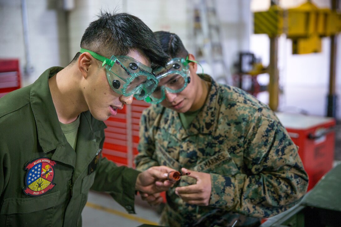 U.S. Marines with Marine Aviation Logistics Squadron (MALS) 13, marine aviation maintenance, conduct routine maintenance and inspections on gear and equipment on Marine Corps Air Station Yuma, Ariz., Nov. 20, 2019. MALS-13 is a tenant squadron aboard MCAS Yuma who's mission is to provide aviation support, guidance, and direction to the Marine Aircraft Group Squadrons. (U.S. Marine Corps photo by Lance Cpl John Hall)